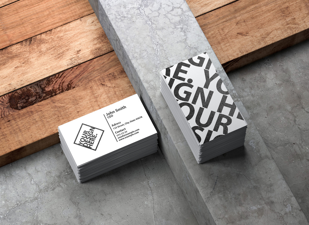2 Stacks of Business Cards on Stone and Wood Background Mockup (PSD Format)