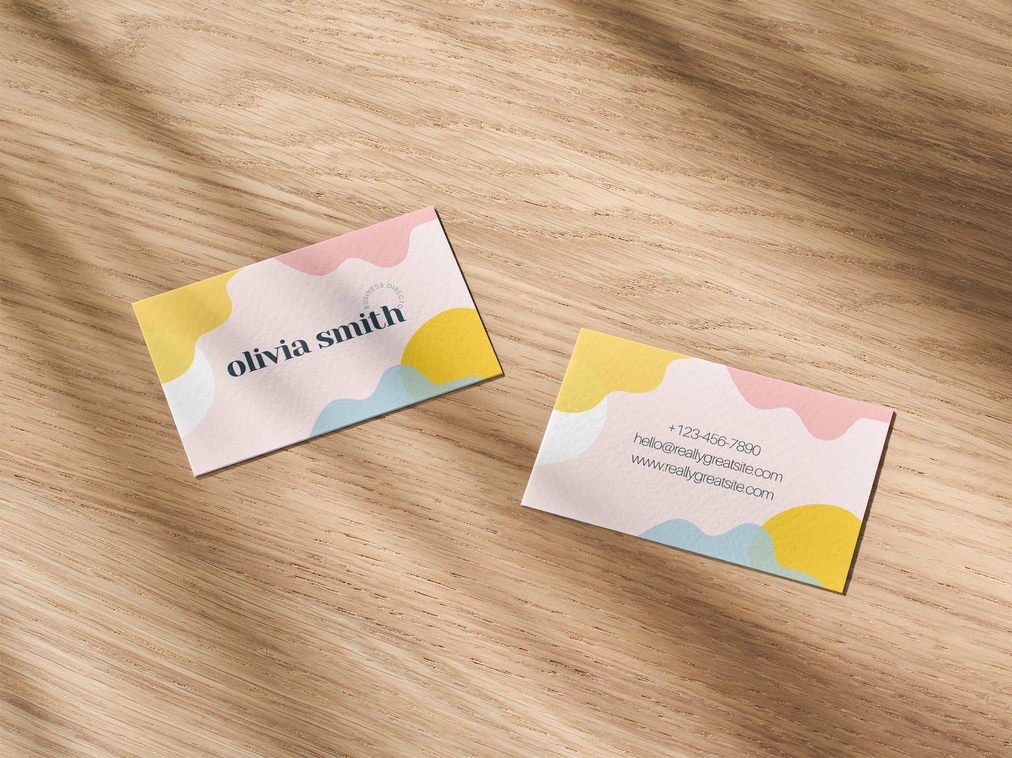 Business Cards Mockup on a Wooden Surface (PSD Format)