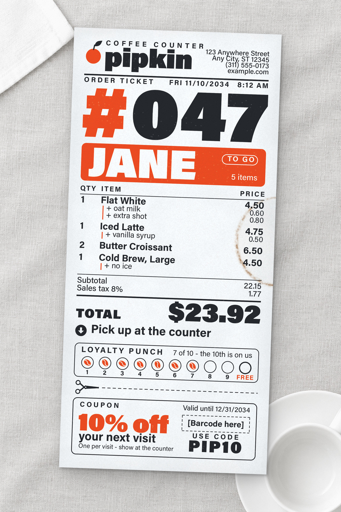 Vertical coffee shop receipt with bold black type, orange highlights, loyalty punches and a tear-off coupon