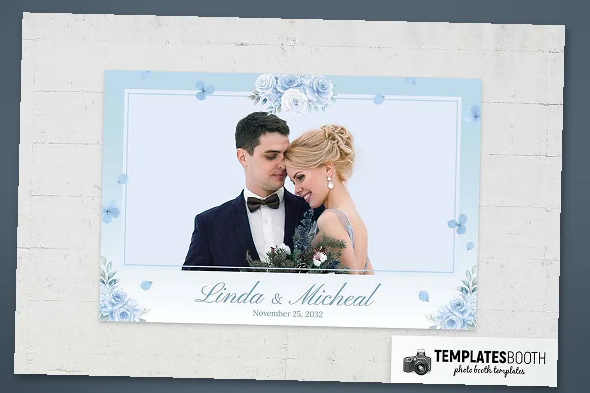 Ice-blue wedding photo strip with two photos, blue and white roses, butterflies, and an oval name panel