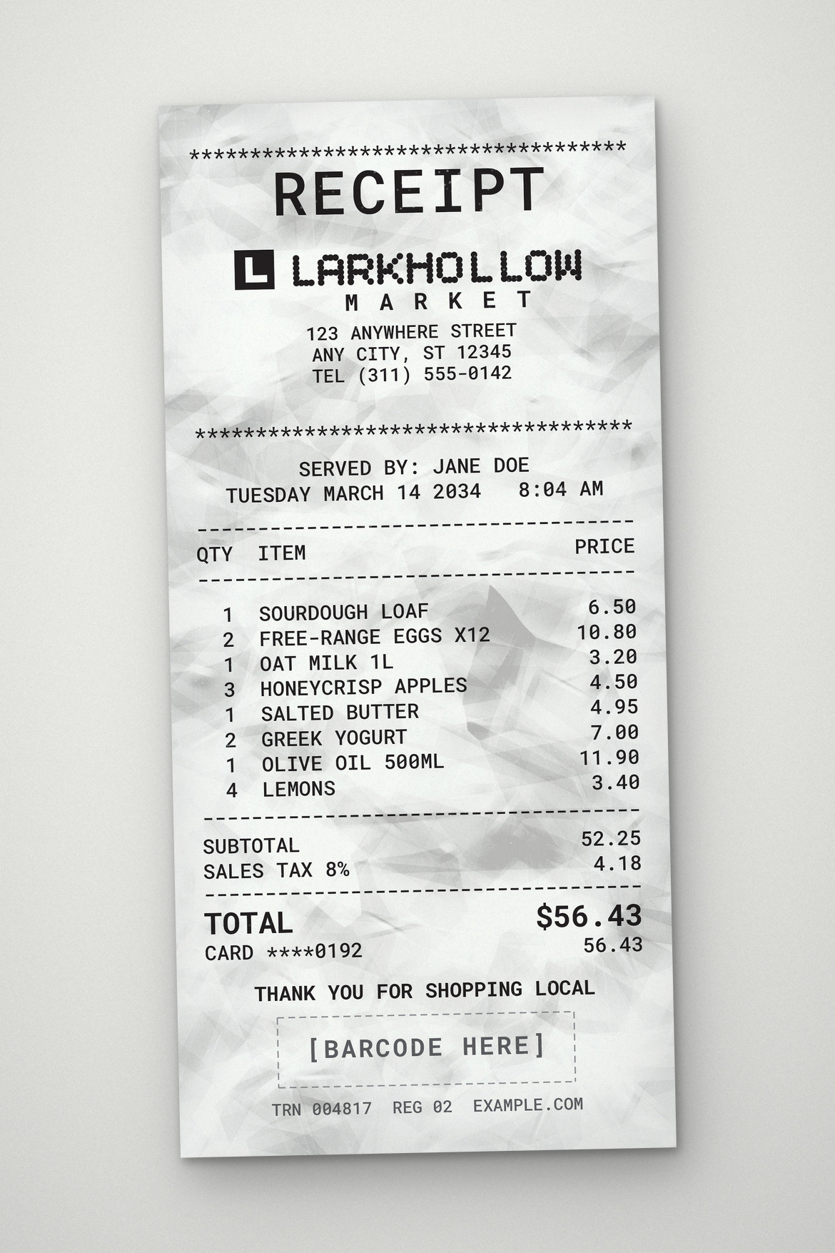 Tall grocery receipt with black monospaced text, itemized price columns and creased white paper
