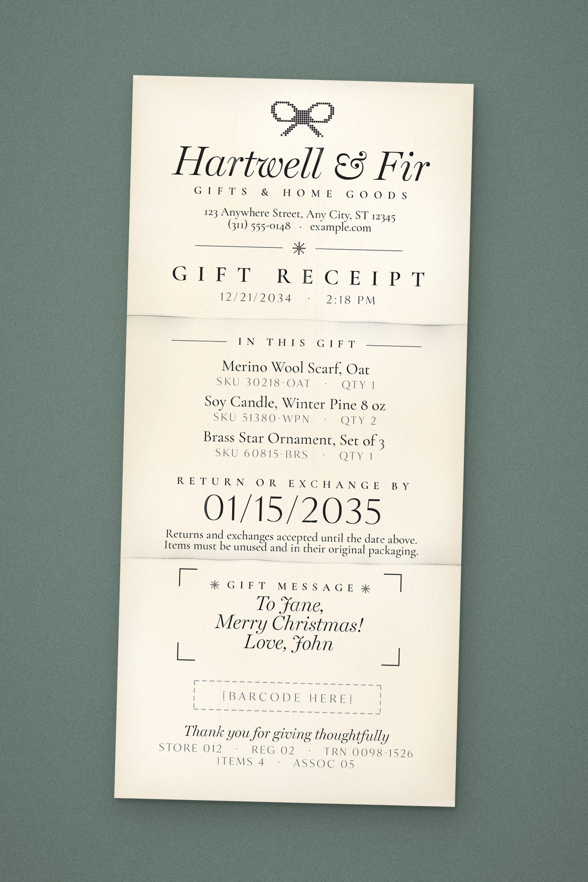 Tall cream gift receipt with centered serif text, a dotted bow, and a framed gift message on sage green